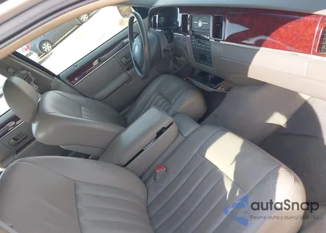 2004 Lincoln Town Car Signature z USA, uszkodzony, nr VIN 1LNHM81W34Y632812